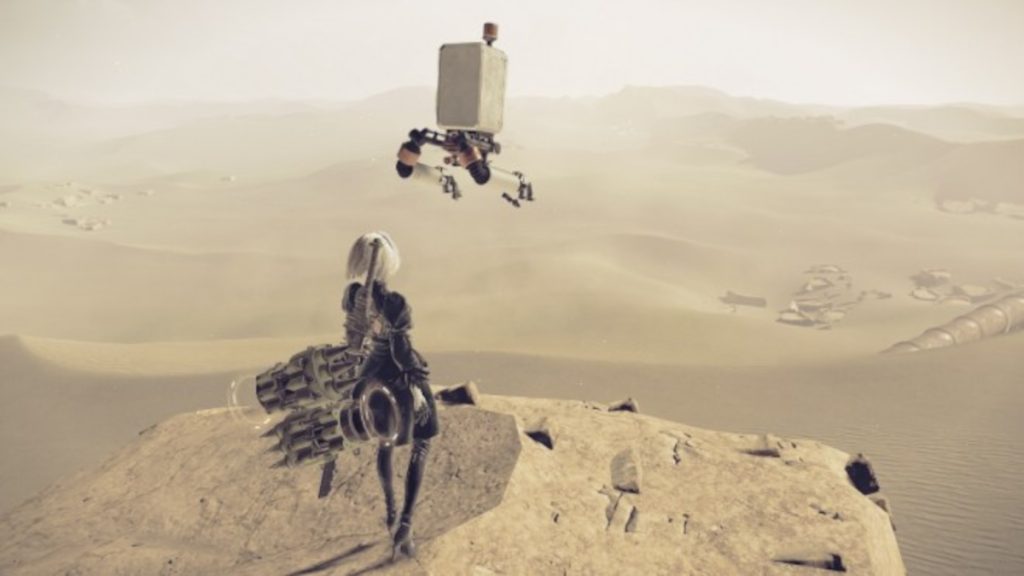 2B and Pod 042 overlook the vast desert in the NieR: Automata game.