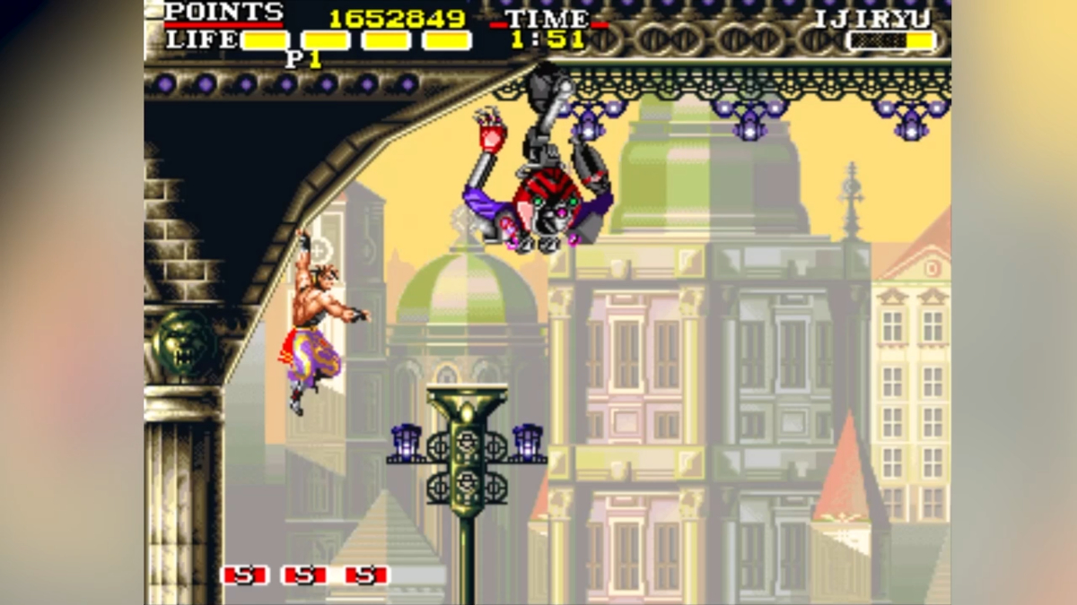 Kirin grapples a beam in the Prague stage in Cannon Dancer.